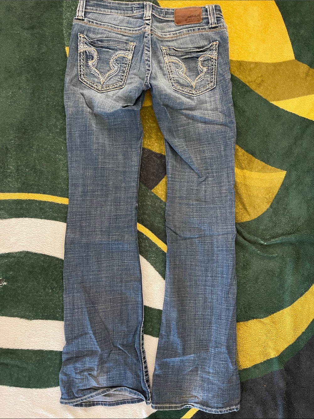 Big Star Women's Faded Blue Flare Jeans with Embroidered Back Pockets. Size 27L